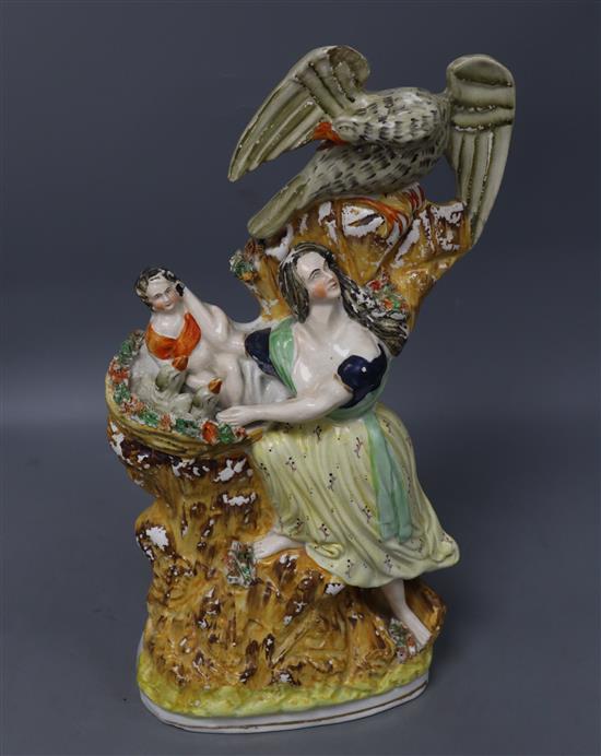 A large Staffordshire pottery group of a mother and eagle Mothers Courage, height 40cm